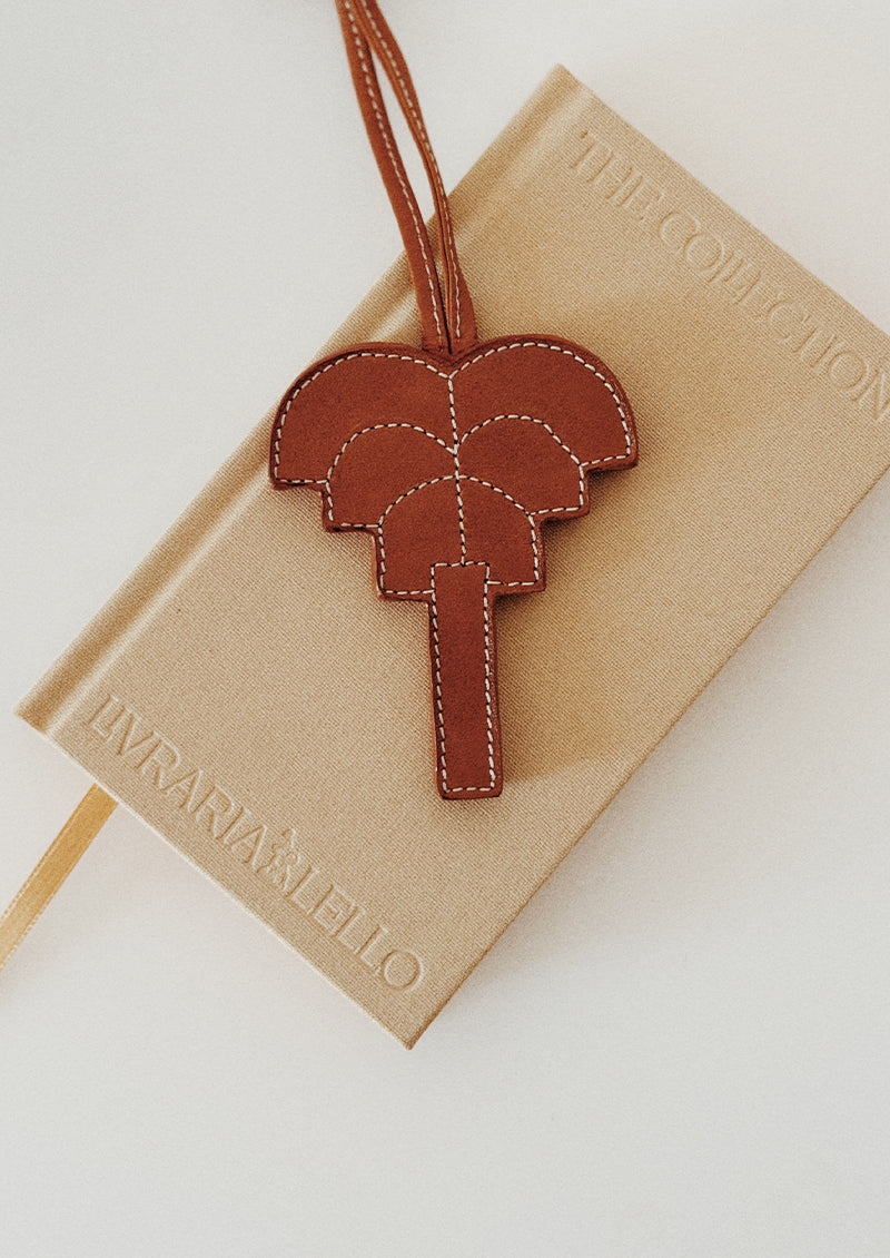 Signature palm leather charm