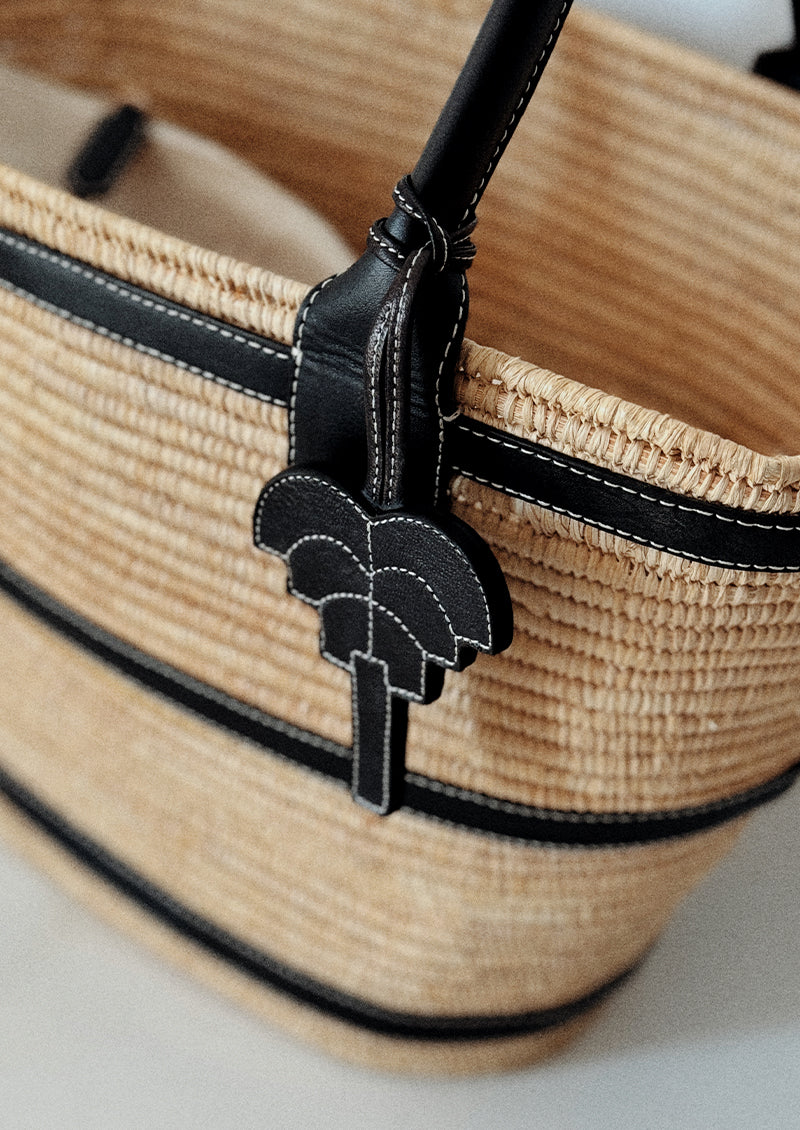 Signature palm leather charm